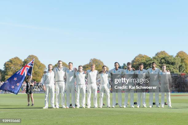 Captain Kane Williamson of New Zealand and his team mates line up for their national anthem prior to day one of the Second Test match between New...