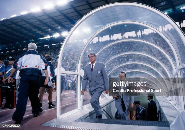 England manager Bobby Robson walks to the dugout before the FIFA World Cup Quarter Final between Cameroon and England at the Stadio San Paolo on July...