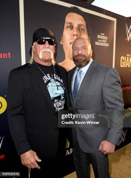 Hulk Hogan and Paul "Triple H" Levesque arrive at the premiere of HBO's "Andre The Giant" at the Cinerama Dome on March 29, 2018 in Los Angeles,...