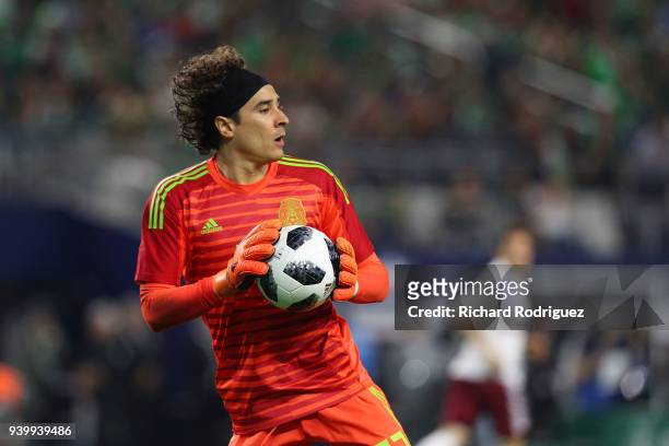 Guillermo Ochoa goalkeeper of Mexico gets ready to throw the ball during an intetnatonal friendly soccer match at AT&T Stadium on March 27, 2018 in...