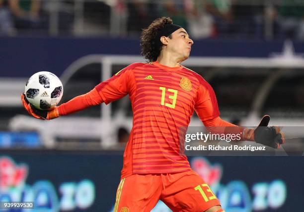 Guillermo Ochoa goalkeeper of Mexico gets ready to throw the ball during an intetnatonal friendly soccer match at AT&T Stadium on March 27, 2018 in...