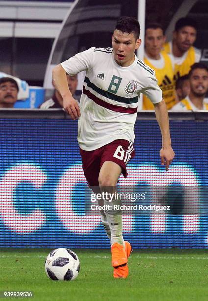 Hirving Lozano of Mexico drives the ball down the field during an international friendly soccer match against Croatia at AT&T Stadium on March 27,...