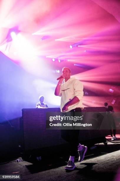 Example performs as a surprise special guest live on stage with Jausz at Brixton Academy on March 29, 2018 in London, England.