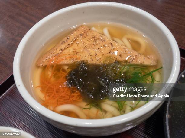 udon of tororo kelp and deep-fried tofu - scallion brush stock pictures, royalty-free photos & images