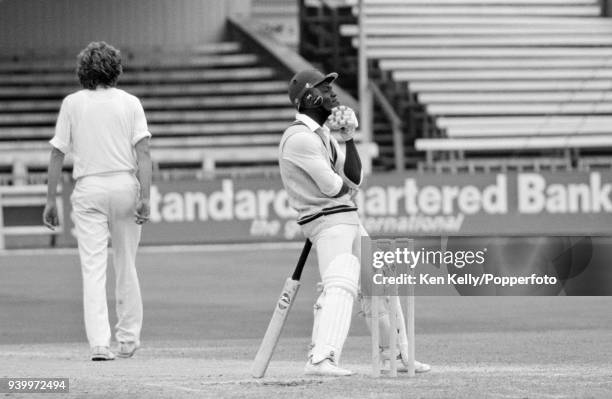 Desmond Haynes of West Indies rests on his bat while batting on day five of the 1st Test match between England and West Indies at Trent Bridge,...