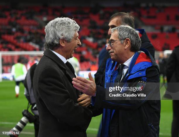 Gianni Rivera and Enrico Castellacci of Italy chat prior to the friendly match between England and Italy at Wembley Stadium on March 27, 2018 in...