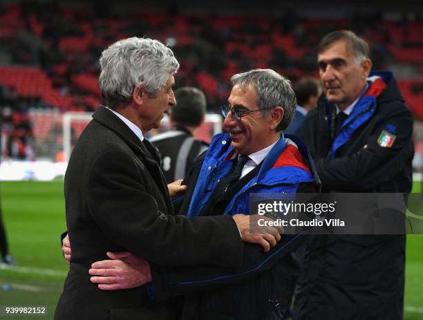 Gianni Rivera and Enrico Castellacci of Italy chat prior to the friendly match between England and Italy at Wembley Stadium on March 27, 2018 in...