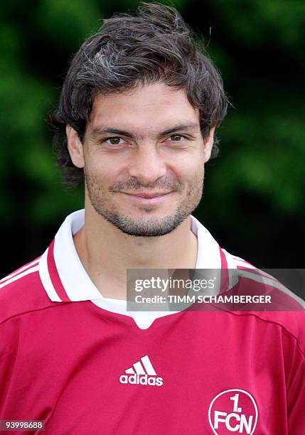 First division Bundesliga football club 1.FC Nuremberg's Greek striker Angelos Charisteas poses for photographers during the team presentation on...