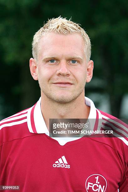 First division Bundesliga football club 1.FC Nuremberg's defender Andreas Wolf poses for photographers during the team presentation on July 8, 2009...