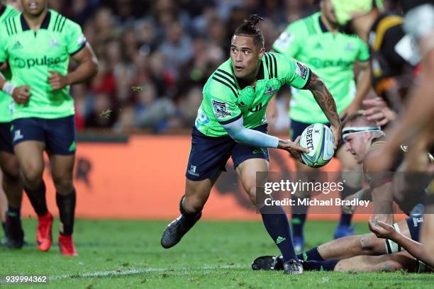 Highlanders Aaron Smith clears the ball during the round seven Super Rugby match between the Chiefs and the Highlanders at FMG Stadium on March 30,...