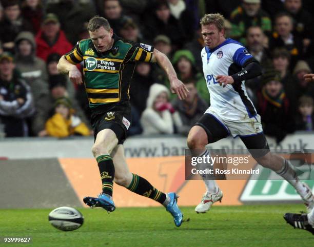 Chris Ashton of Northampton races away to score the first try during the Guinness Premiership match between Northampton Saints and Bath at Franklin's...