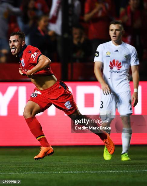Ben Garuccio of Adelaide United scores and celebrates during the round 25 A-League match between Adelaide United and the Wellington Phoenix at...