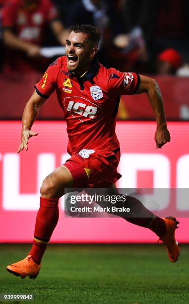 Ben Garuccio of Adelaide United scores and celebrates during the round 25 A-League match between Adelaide United and the Wellington Phoenix at...