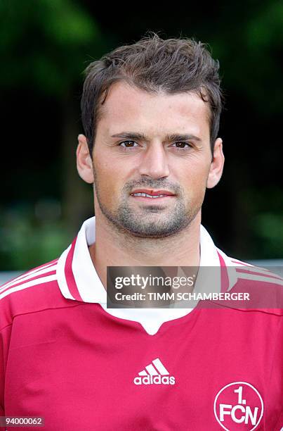 First division Bundesliga football club 1.FC Nuremberg's Swiss striker Albert Bunjaku poses for photographers during the team presentation on July 8,...