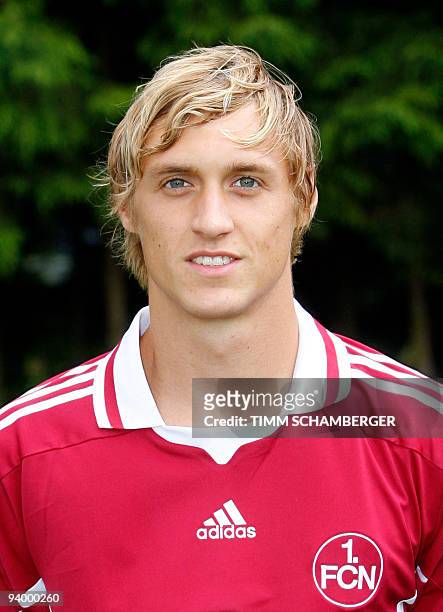 First division Bundesliga football club 1.FC Nuremberg's midfielder Marcel Risse poses for photographers during the team presentation on July 8, 2009...