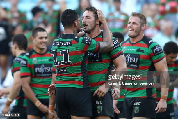 John Sutton of the Rabbitohs and Sam Burgess of the Rabbitohs celebrate winning the round four AFL match between the South Sydney Rabbitohs and the...