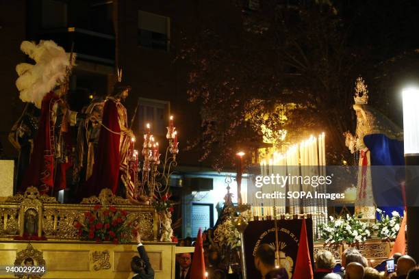 The meeting of the two steps of the cofradia of "Jesus of the Sentence" during the singing of an "saeta". The Holy Week is the most important and...
