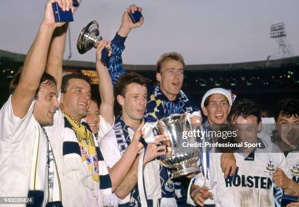 Tottenham Hotspur players celebrate with the trophy after the FA Cup Final between Nottingham Forest and Tottenham Hotspur at Wembley Stadium on May...