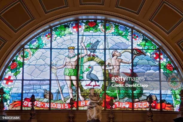 stained glass and the liverpool coat of arms in the great hall, st georges hall in liverpool - doric arches stock pictures, royalty-free photos & images