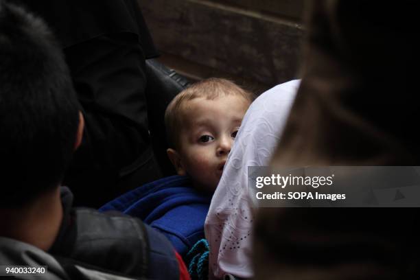 Children coming out of Ghouta. According to reports, civilians, mostly ill people and injured that need urgent medical attention, were evacuated from...