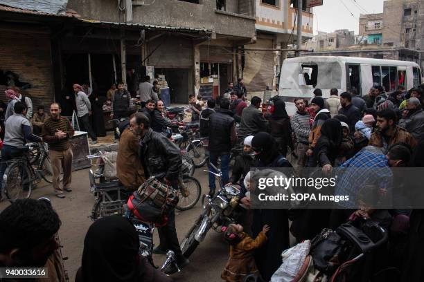People seen gathering around a evacuation bus to say goodbye to their family members. According to reports, civilians, mostly ill people and injured...