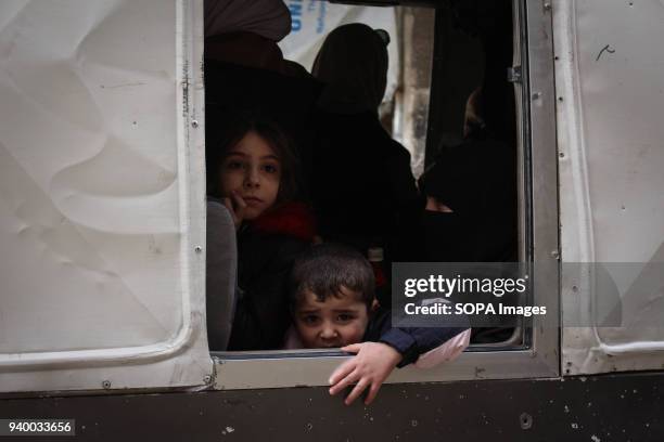 Children seen on board the evacuation bus. According to reports, civilians, mostly ill people and injured that need urgent medical attention, were...