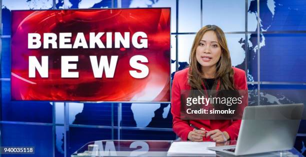 newsreader in television studio - newscaster stock pictures, royalty-free photos & images