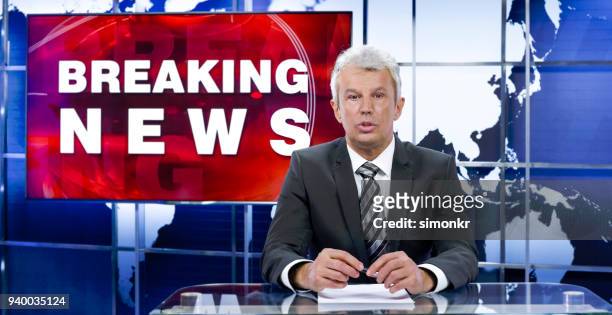 newsreader in television studio - journalist desk stock pictures, royalty-free photos & images