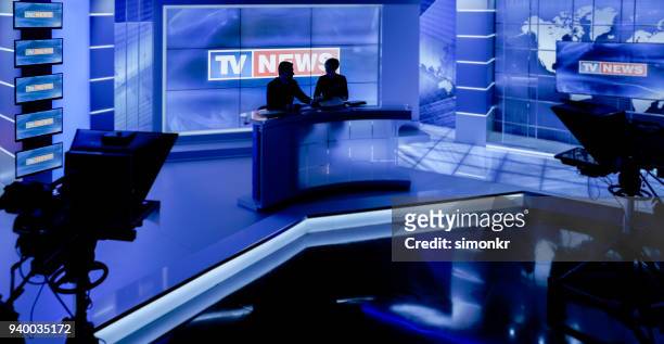 newsreaders in television studio - press conference stock pictures, royalty-free photos & images
