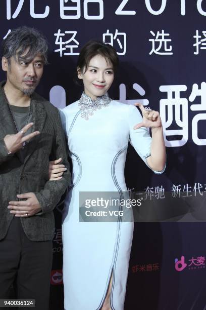 Actor Wu Xiubo and actress Tamia Liu Tao pose on the red carpet 2018 Youku Young Choice Ceremony on March 30, 2018 in Beijing, China.