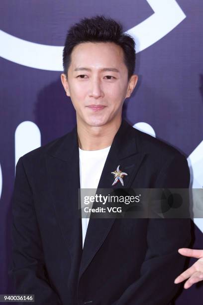 Actor Han Geng poses on the red carpet of 2018 Youku Young Choice Ceremony on March 30, 2018 in Beijing, China.