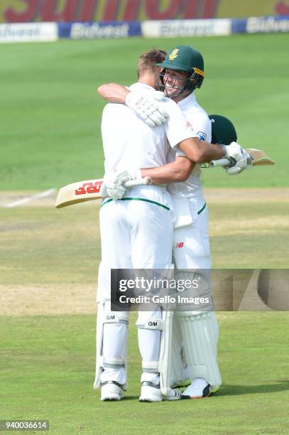 Aiden Markram of the Proteas celebrates his 100 runs with AB de Villiers during day 1 of the 4th Sunfoil Test match between South Africa and...