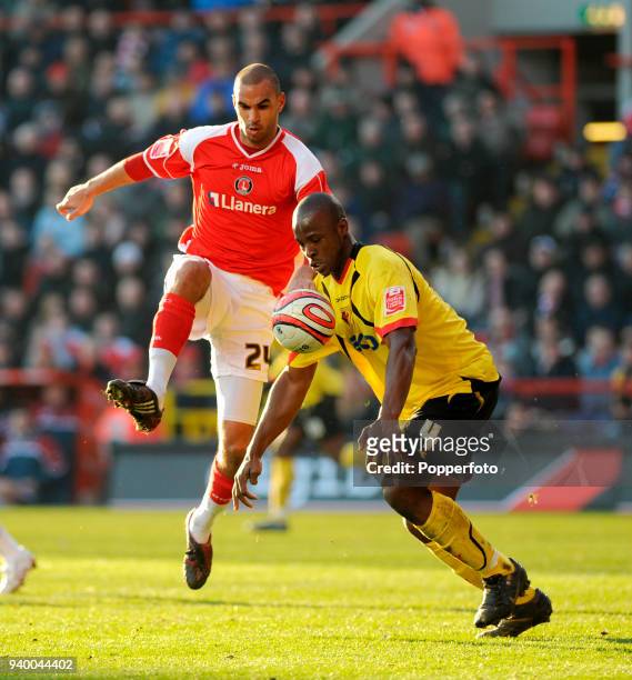Jonathan Fortune of Charlton Athletic and Danny Shittu of Watford in action during the Coca-Cola Championship match between Charlton Athletic and...