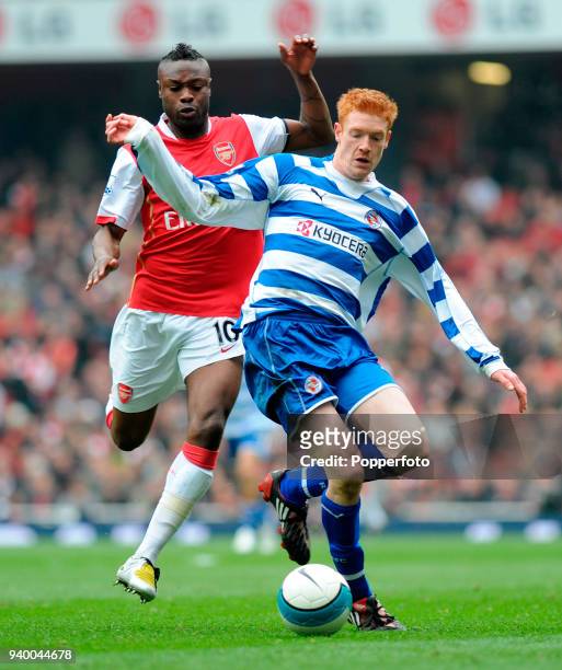William Gallas of Arsenal shadows Dave Kitson of Reading during the Barclays Premier League match between Arsenal and Reading at the Emirates Stadium...
