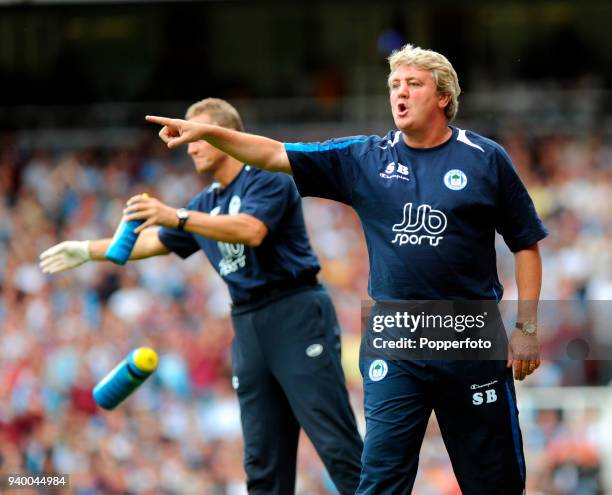 Wigan Athletic manager Steve Bruce shouts from the touchline during the Barclays Premier League match between West Ham United and Wigan Athletic at...