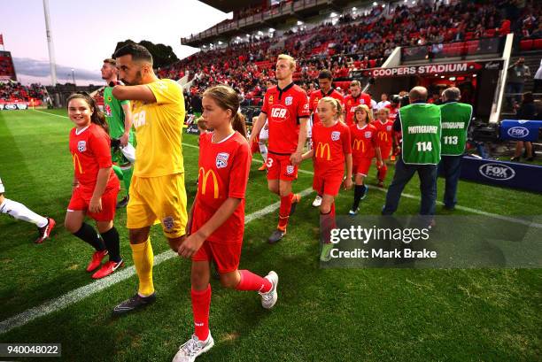 Teams take to the field during the round 25 A-League match between Adelaide United and the Wellington Phoenix at Coopers Stadium on March 30, 2018 in...