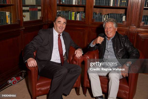 Driver Nigel Mansell and Mario Andretti are photographed for Paris Match on December 2017 in Paris, France.