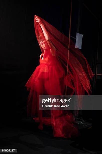 Model backstage ahead of the Murat Aytulum show during Mercedes Benz Fashion Week Istanbul at Zorlu Performance Hall on March 30, 2018 in Istanbul,...