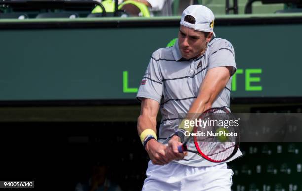 John Isner, from the USA, in action during his fourth round match against Hyeon Chung, from Korea. Isner defeated Chung 6-1, 6-4 for a place in the...