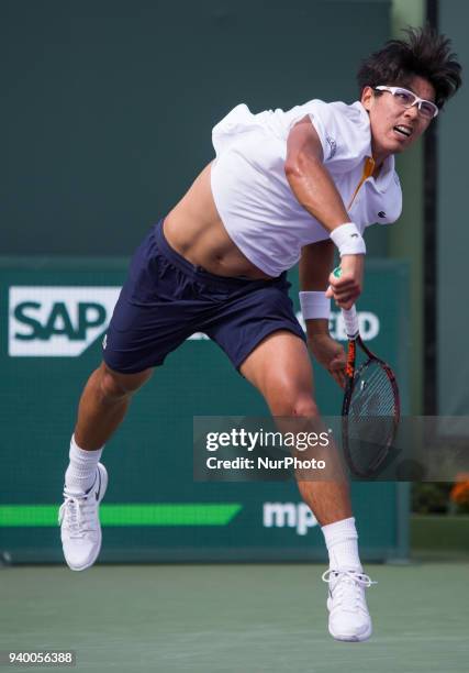 Hyeon Chung, from Korea, in action during his fourth round match against John Isner, from the USA. Isner finally prevailed and defeated Chung 6-1,...