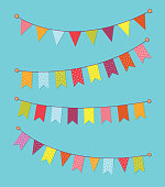 Vector set of decorative party pennants with different sizes and lengths. Celebrate flags. Rainbow garland. Birthday decoration. Hanging colored flags. Vector graphic illustration, EPS10.