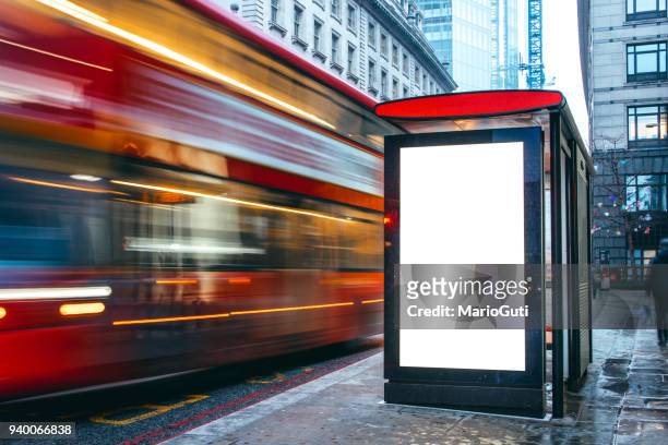 blank billboard at bus station - advertising sign imagens e fotografias de stock