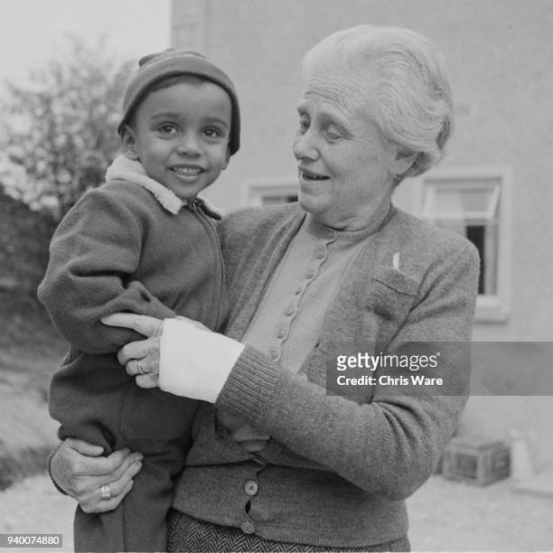 Lady Isobel Cripps , widow of statesman Sir Stafford Cripps, with her grandson Kwame Anthony Appiah outside her new home in Minchinhampton, in the...