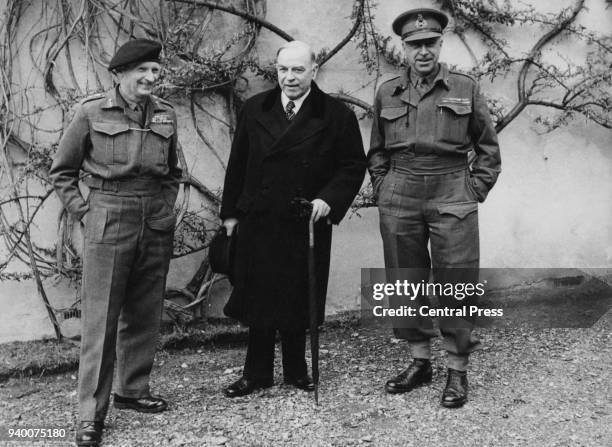 William Lyon Mackenzie King , the Prime Minister of Canada, visits General Bernard Law Montgomery during World War II, 1944. From left to right,...