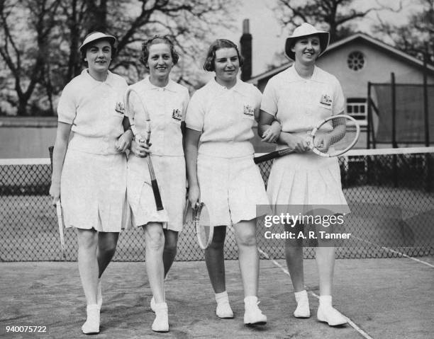 The Australian women's tennis team walk to the RAC Country Club courts in Epsom, to begin practice for the Wimbledon championships, 17th April 1938....