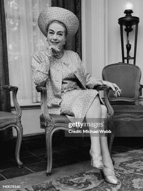 American actress Joan Crawford during a photocall at a London hotel, 4th October 1966. She is in the UK to film the British horror-thriller...