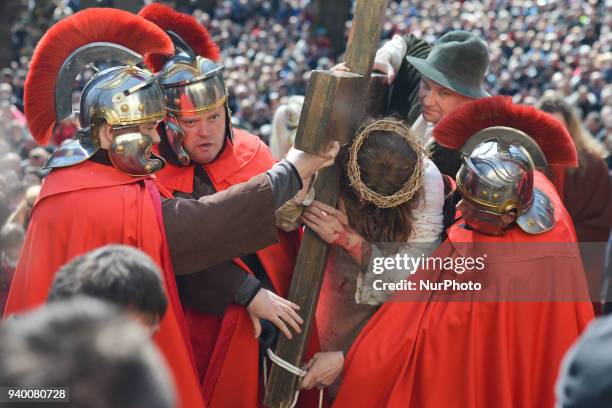 Jesus carries the cross, a scene from a reenactment of the Way of the Cross in Kalwaria Zebrzydowska. On Friday, March 30 in Kalwaria Zebrzydowska,...