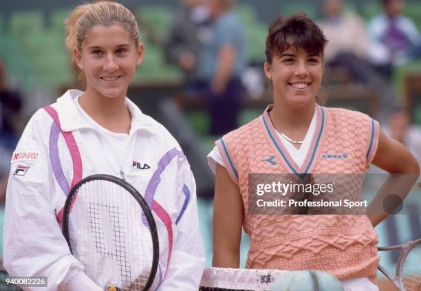 Monica Seles of Yugoslavia and Jennifer Capriati of the USA pose together before their Women's Singles Semi-Final match during the French Open Tennis...