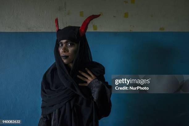 Indonesian Catholic devotees participate in a re-enactment of the crucifixion of Jesus Christ on Good Friday procession at Church of Santa Maria A....