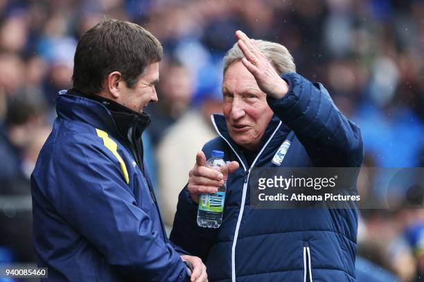 Cardiff City manager Neil Warnock laughs with Burton Albion manager Nigel Clough prior to kick off of the Sky Bet Championship match between Cardiff...